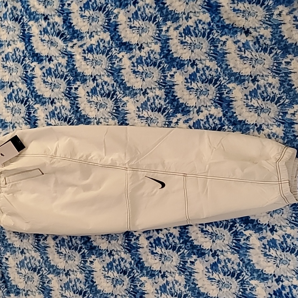 NIKE REPEL OVERSIZED HIGH RISE LOOSE PANTS.  SIZE XL